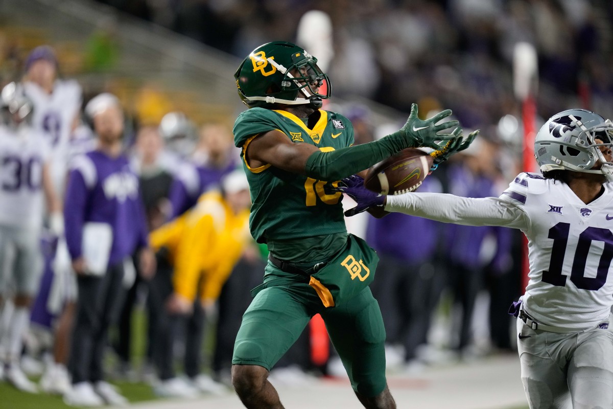 Nov 12, 2022; Waco, Texas, USA; Kansas State Wildcats cornerback Jacob Parrish (10) breaks up a pass intended for Baylor Bears wide receiver Hal Presley (16) during the second half at McLane Stadium. Mandatory Credit: Chris Jones-USA TODAY Sports